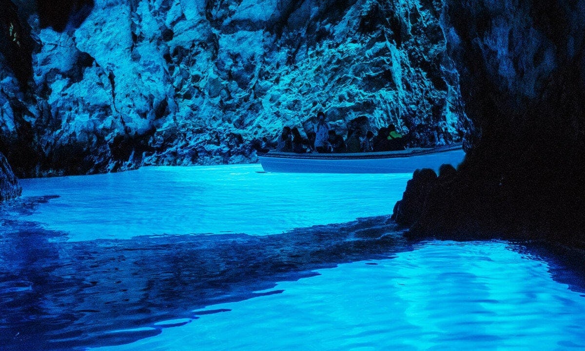 We'll be visiting the Blue Cave, a place where sunlight reflects through the sea and colors the whole cave in light blue color. You will hear some interesting stories from the local guide and enjoy the view. In the peak season you might need to wait to get in. 