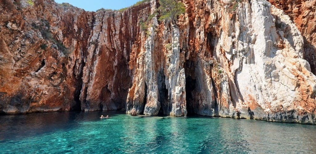 The natural wonder of Hvar island, Red rocks (Croatian: Crvene Stijene) can not be reached from the land. Ideal place for swimming and snorkeling in one of the small caves in the area. 